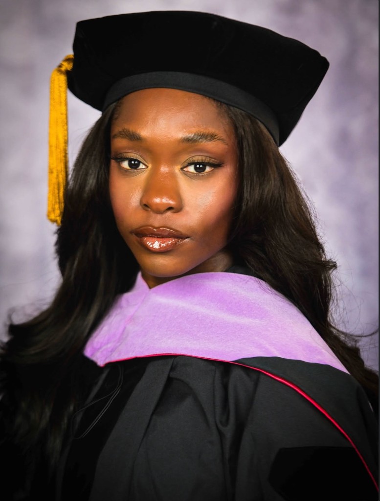 Dr. Omolara Akinfemiwa in graduation regalia